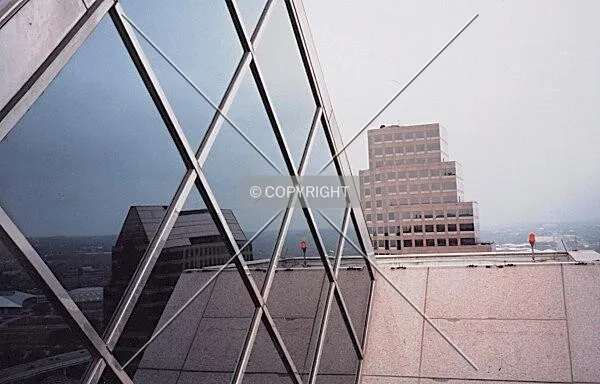 Glass reflections on roof 287 feet high