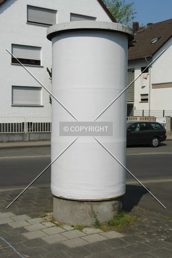 An empty advertising pillar