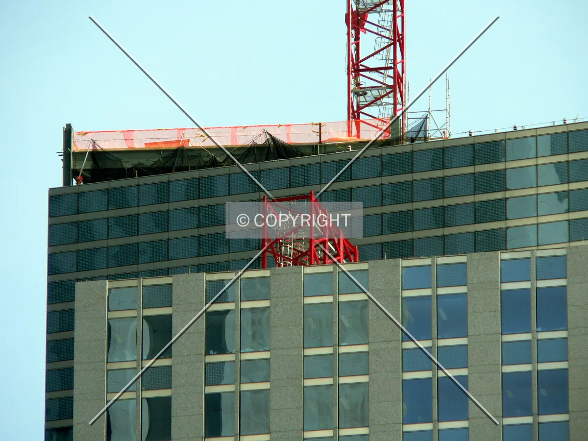 View from the west with a tower crane section visible resting on a setback