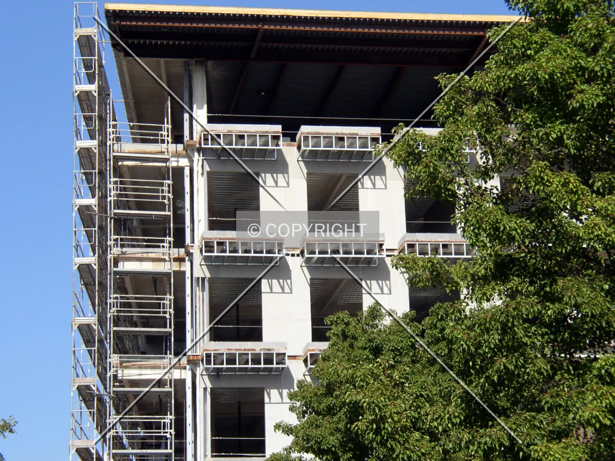 Detail of the upper floors on the northwest corner of the western facade