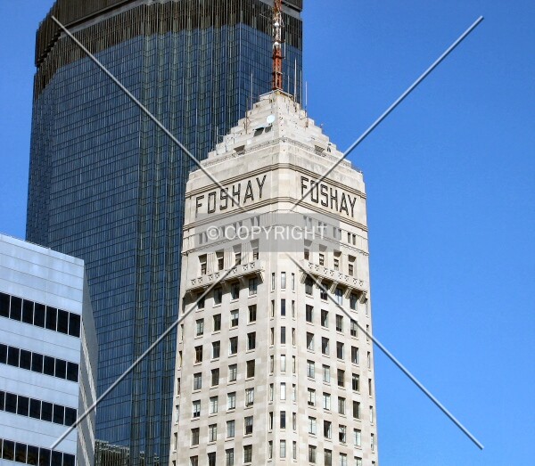 Ziggurat roof, FOSHAY letters, and observation deck, with the IDS Tower rising behind