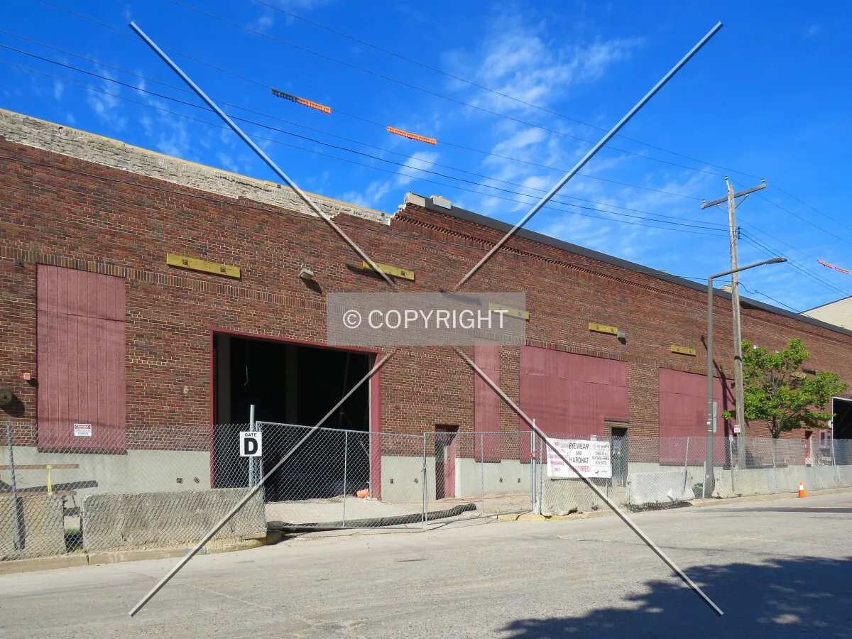 Partial demolition along Raymond Avenue to allow new construction inside and atop the original building