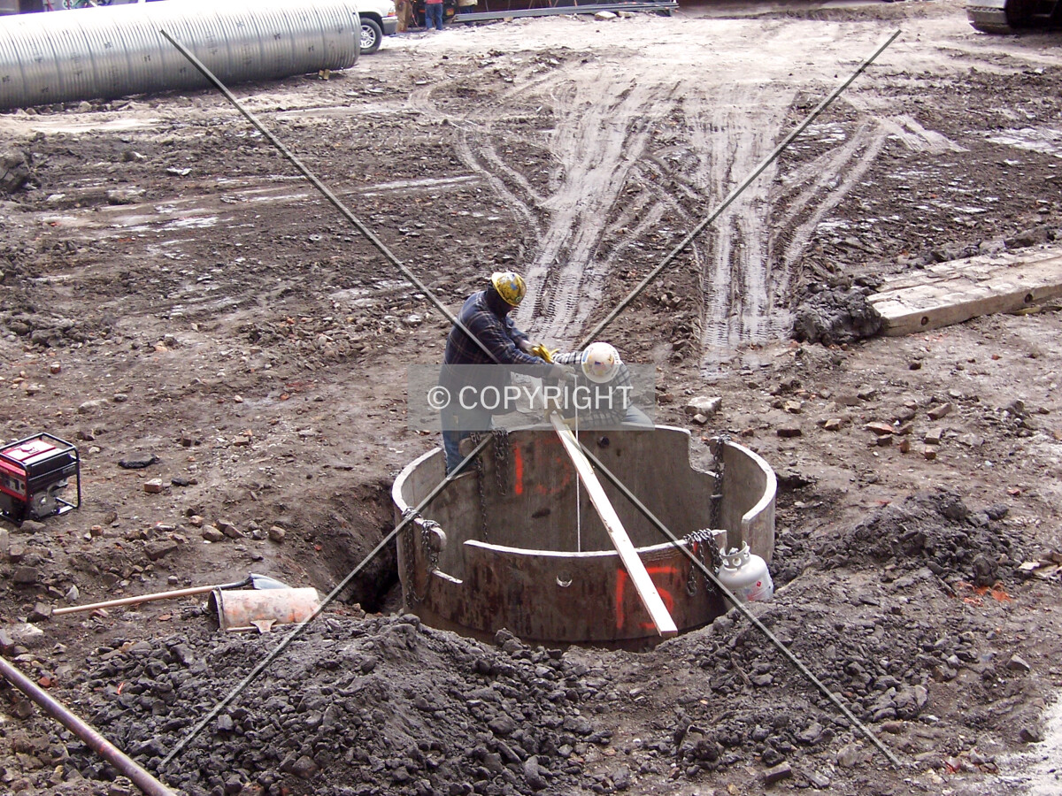 Measuring the depth of a caisson in the center of the site
