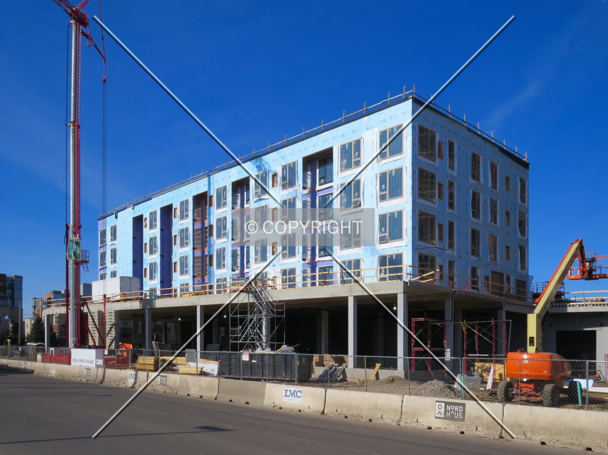 View to the west across 1st Avenue NE