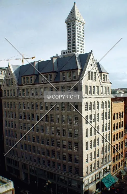 Lowman Building was around many years before the 1914 Smith Tower was built