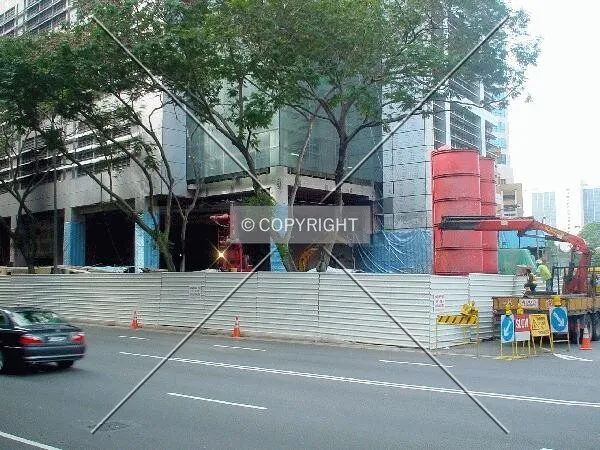 Work being undertaken to correct the building's tilt, which is delaying its completion