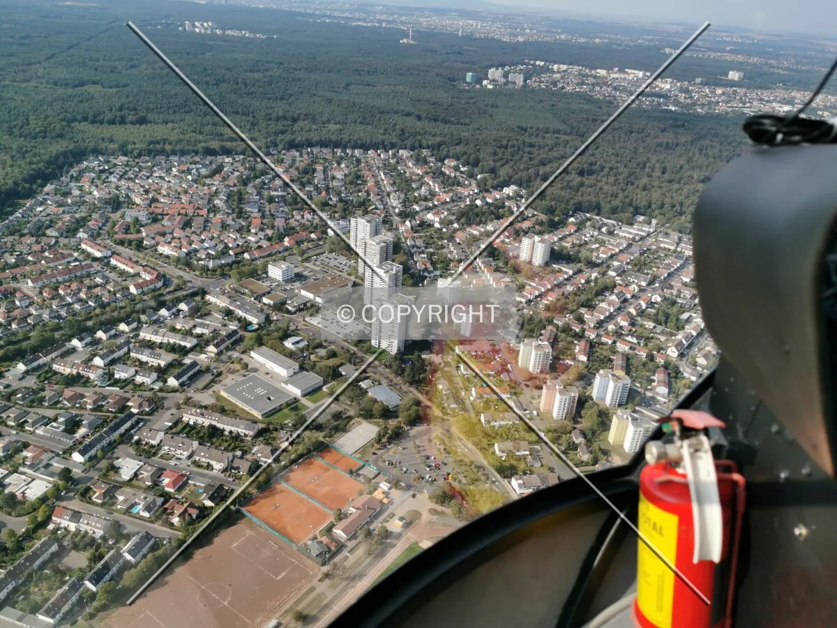 Flight with a helicopter from Egelsbach to Frankfurt - here: Panorama of Dietzenbach