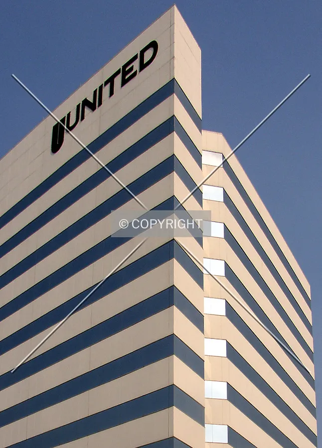 Detail of the upper floors and signage on the northwest corner