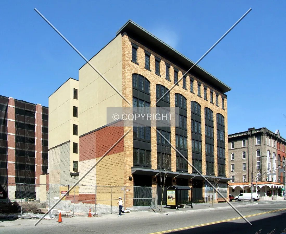 View from the southwest across 14th Street with the Garden Street Lofts site to the left
