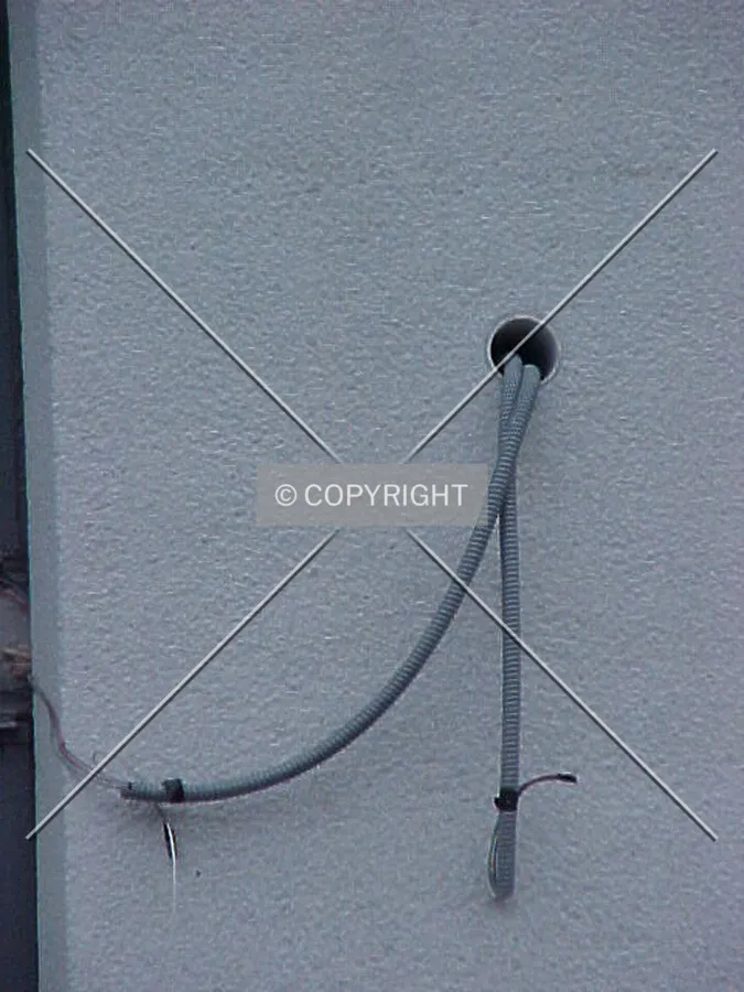 Wiring for an external light fixture on the north facade