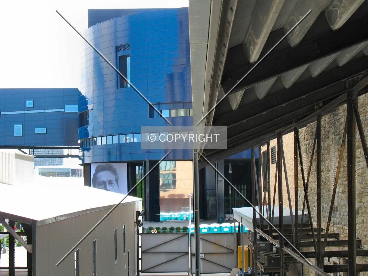View to the west from above the Mill City Cafe outdoor patio, along the old train shed to the Guthrie Theater