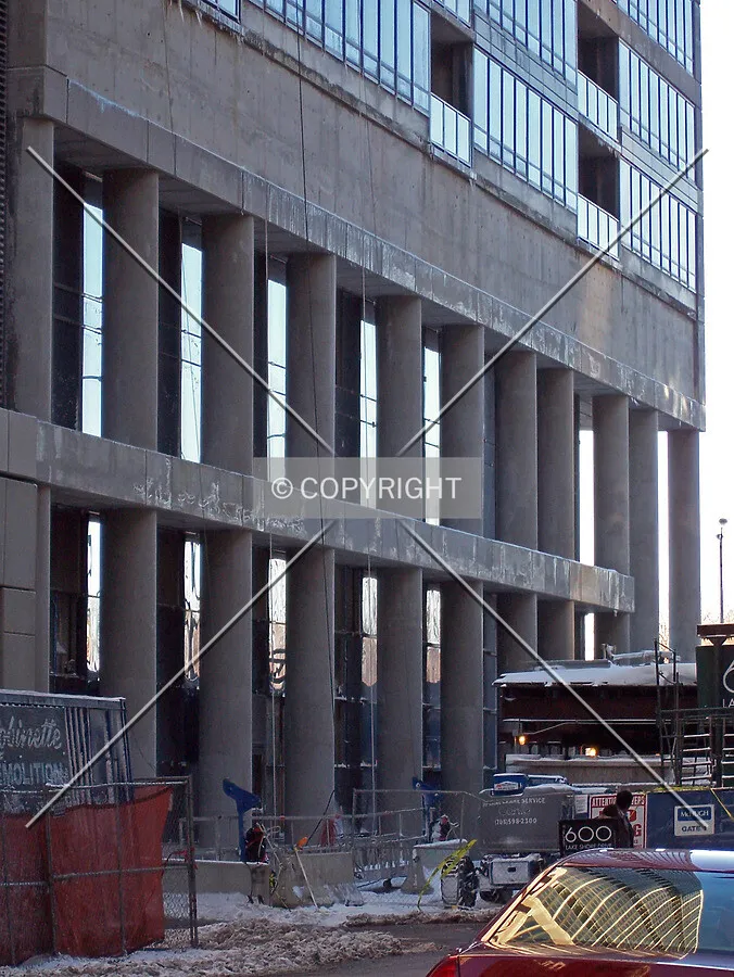 Colonnade along Ohio Street, and a reflection of the tower visible in the car window