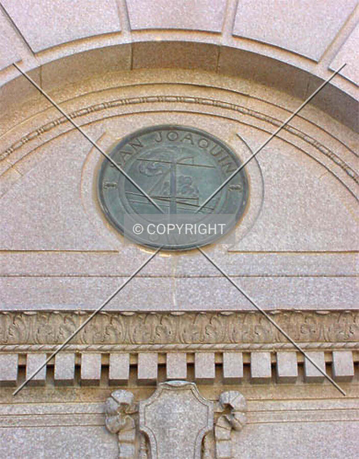 Original plaque over door