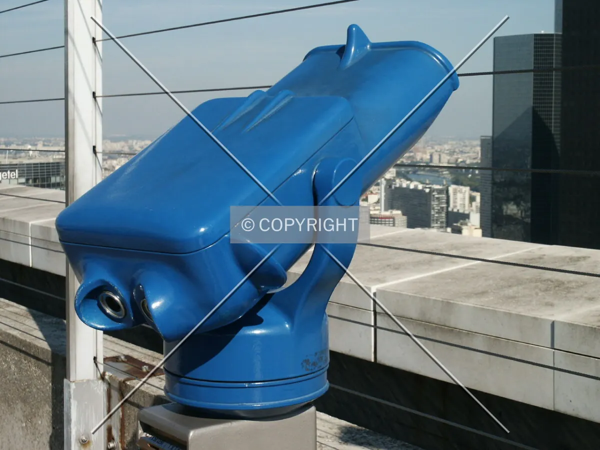 Binoculars pointed at Paris
