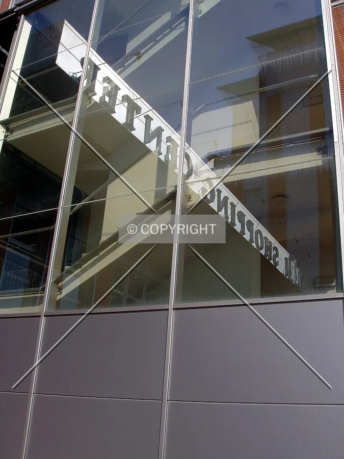 The glass curtain of the stairs