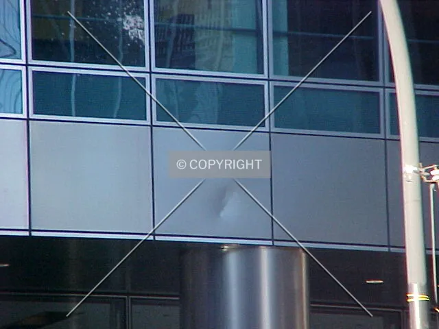 A dented metal panel on the southern facade