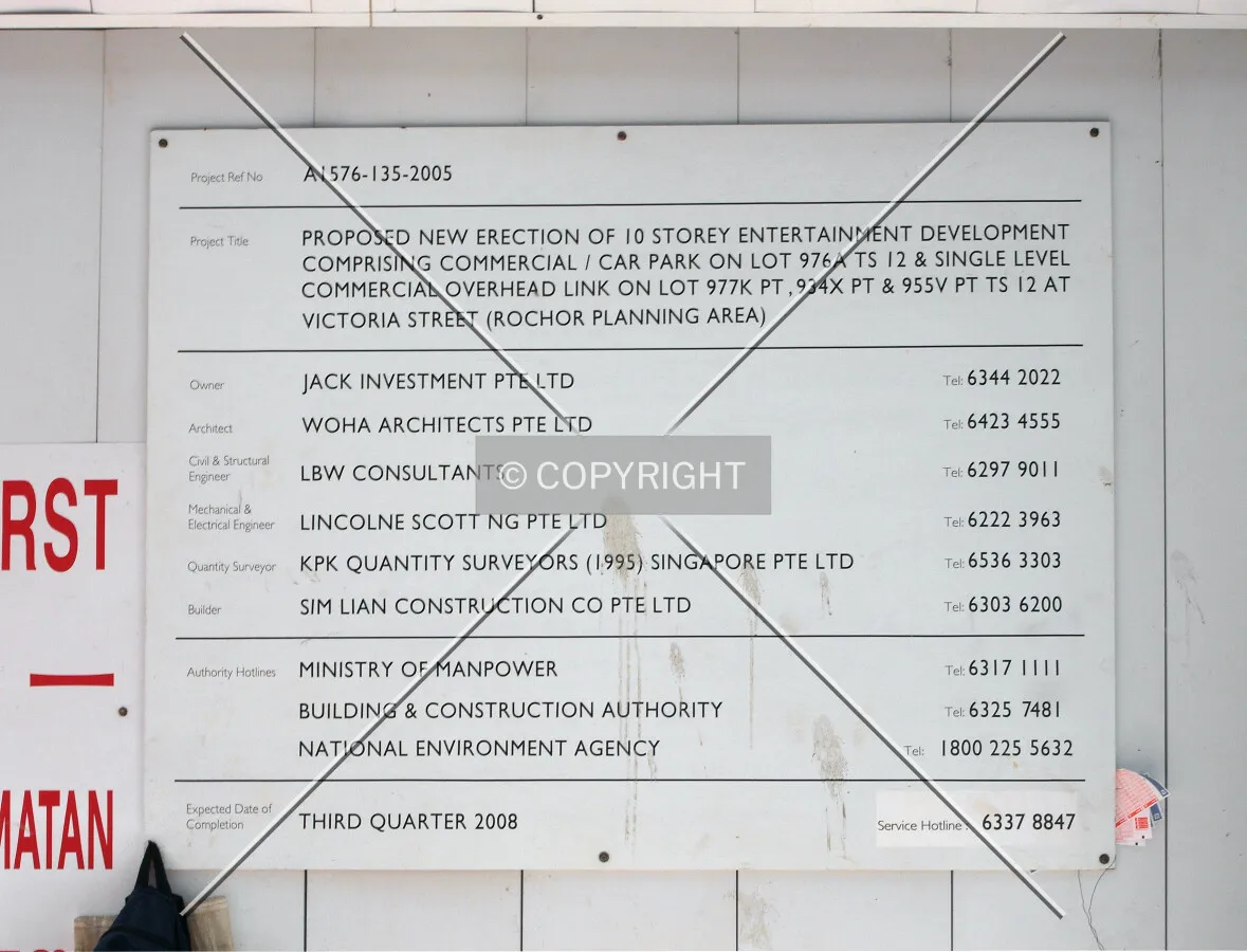 Project information displayed on the construction site fence