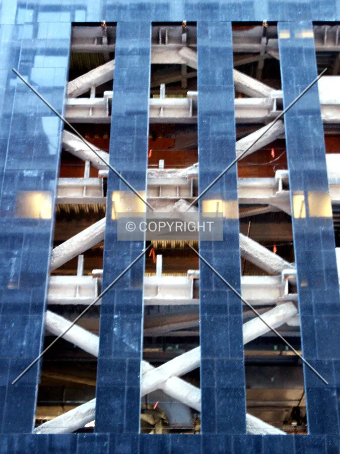 X-beams behind the north facade