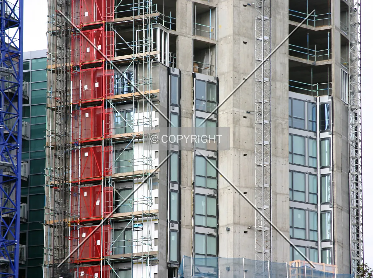 View north showing façade installation