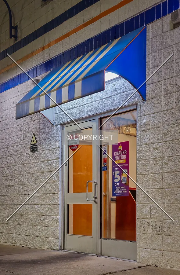 Front entrance at night; September 30, 2024