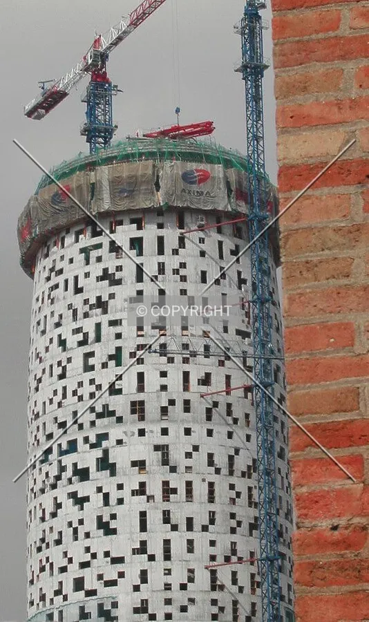View of the tower, the wall helps to see the shape of the tower