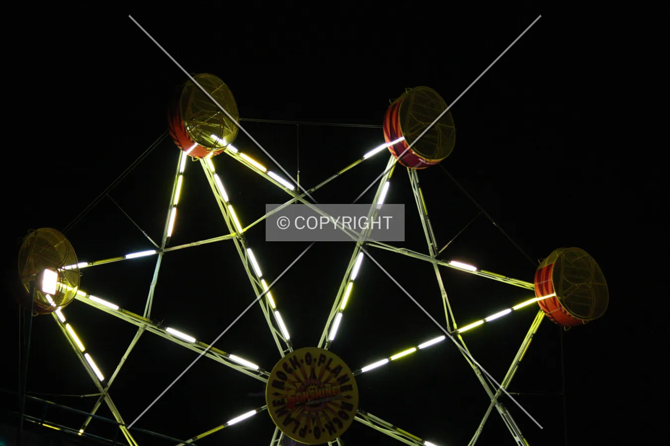 Rock-O-Plane at night