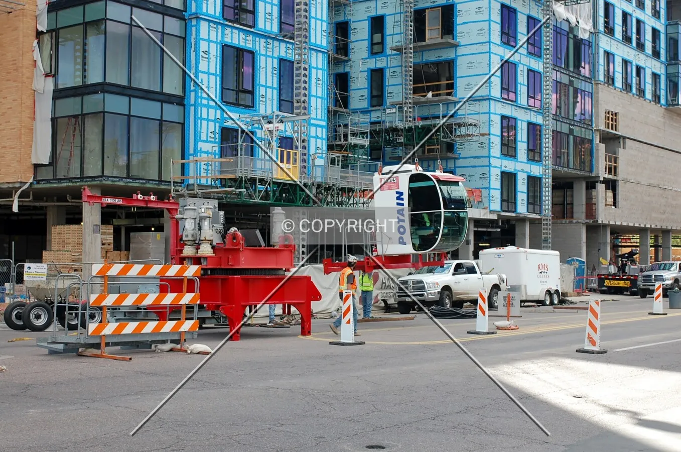 Crew dismantling the tower crane