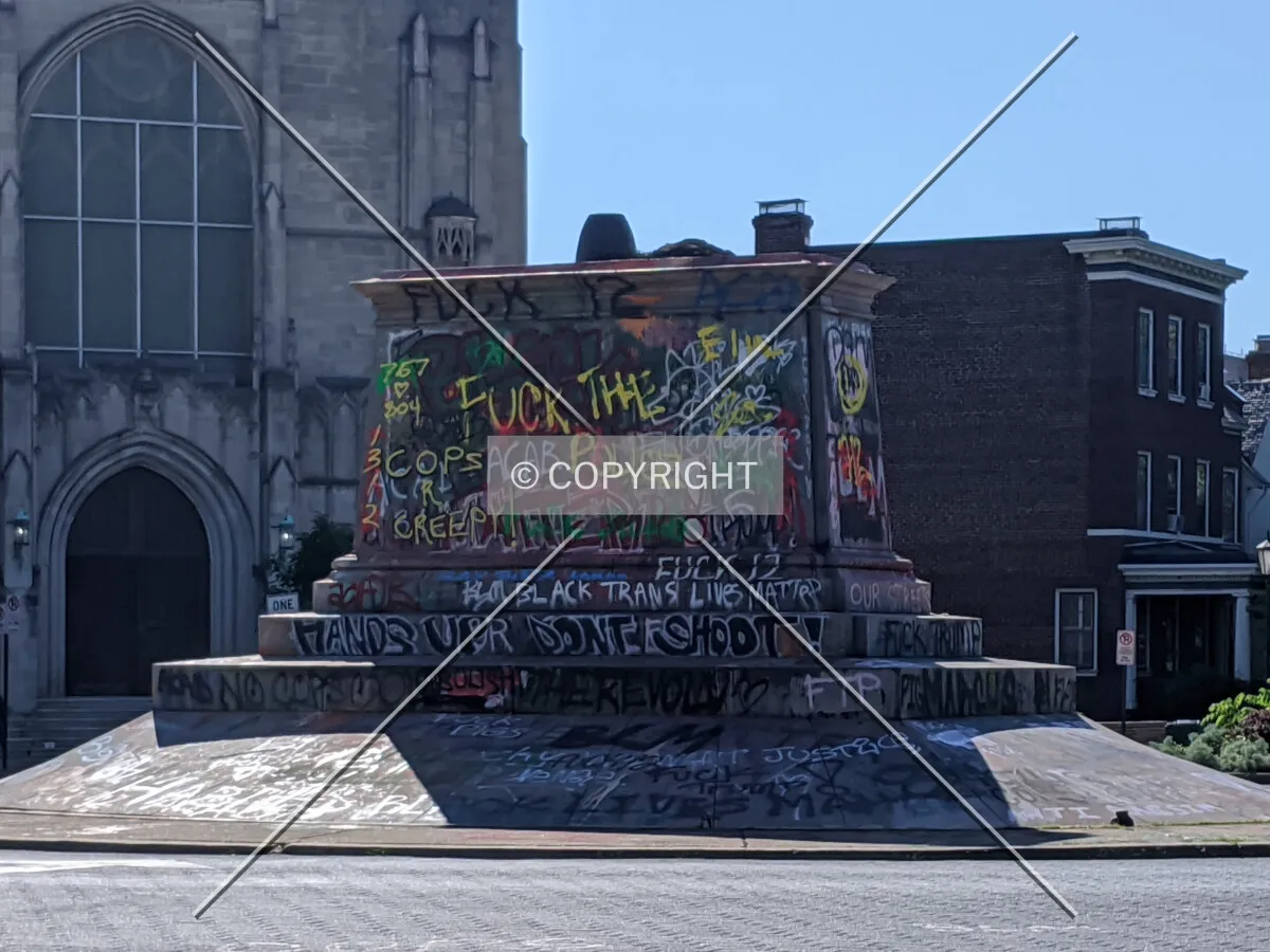 All that remains is the graffitied pedestal after its removal in July 2020