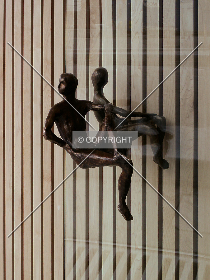 Male door handles between the lobby and vestibule