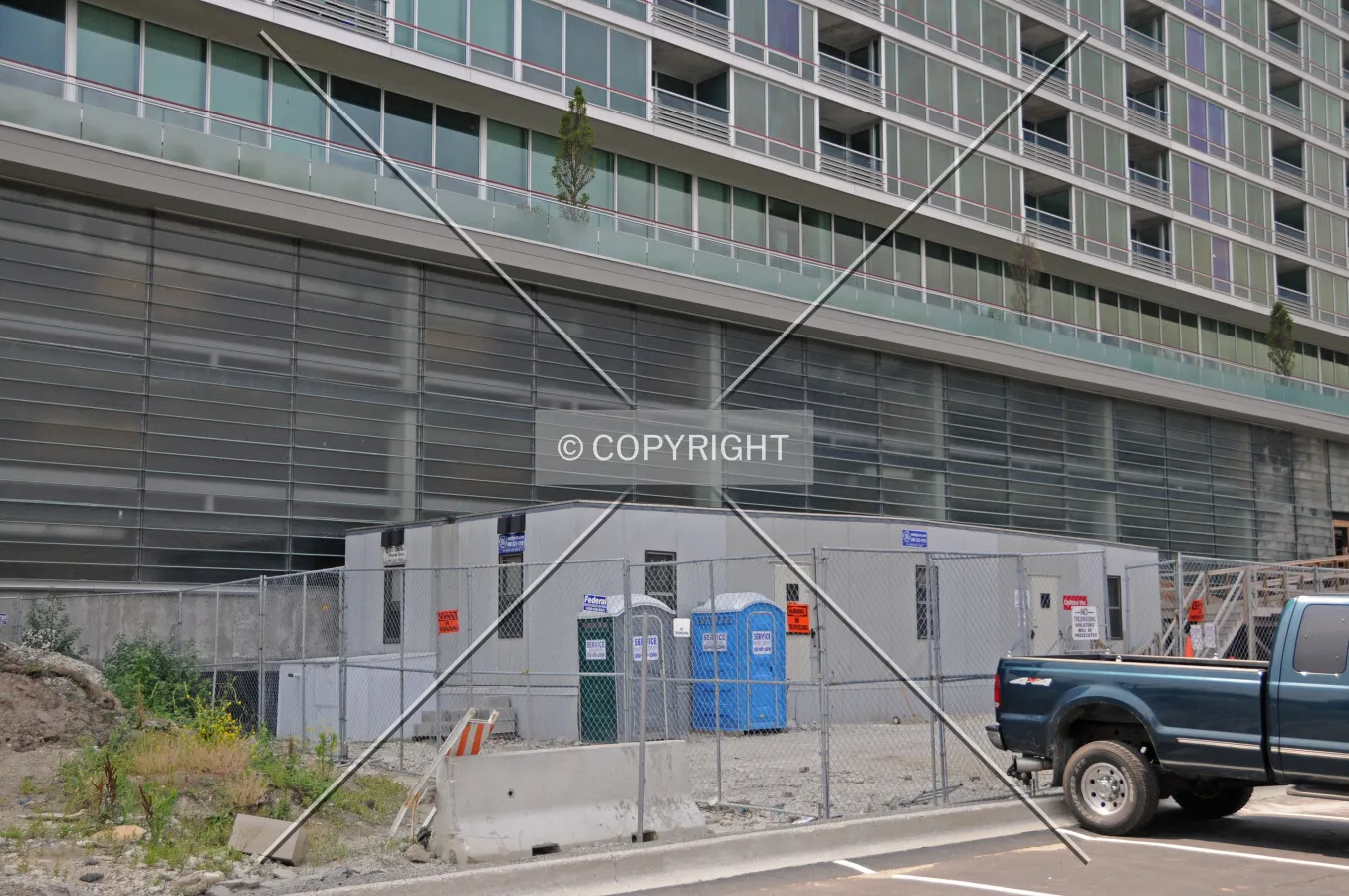 Construction trailers to the north of the Maple Tower's base