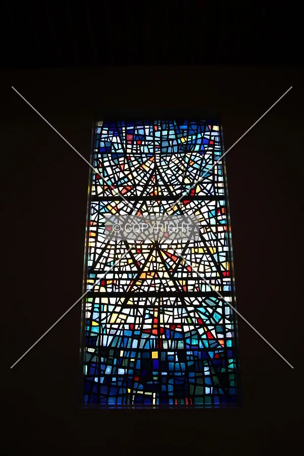 Stained glass window on west wall.
