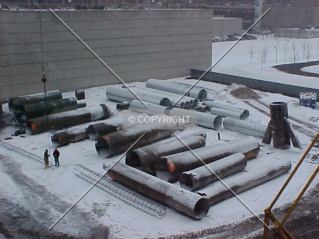 Construction material including: caisson tops, caisson liners and reinforcing rebar cages