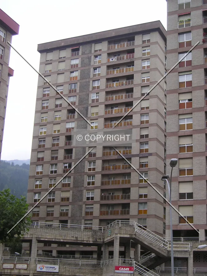 View of the east facade from between other buildings of the complex