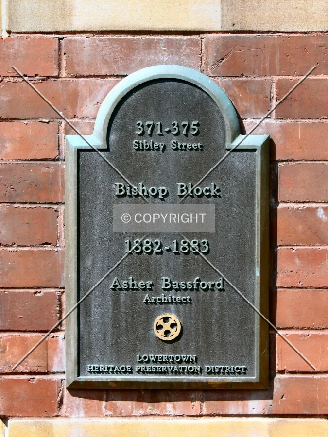 Commemorative plaque on the preserved Bishop Block facade