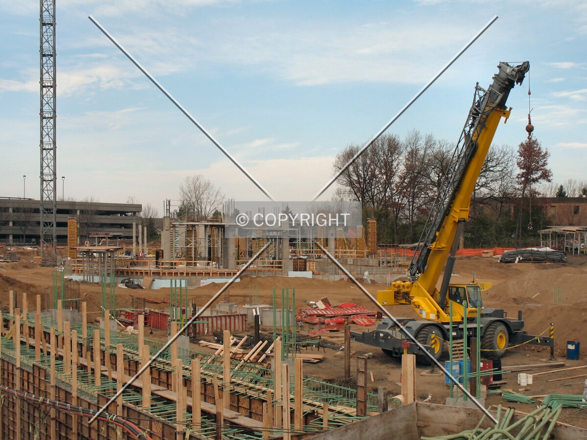 View to the northwest from West 83rd Street, over columns for the parking ramp