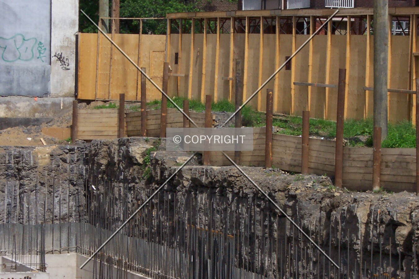 The construction wall built to protect pedestrians along Albert Street