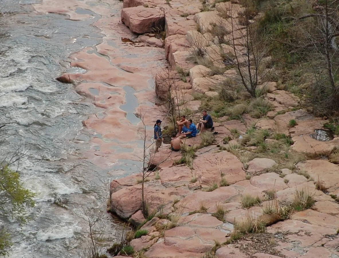 Hikers along the banks of Oak Creek
