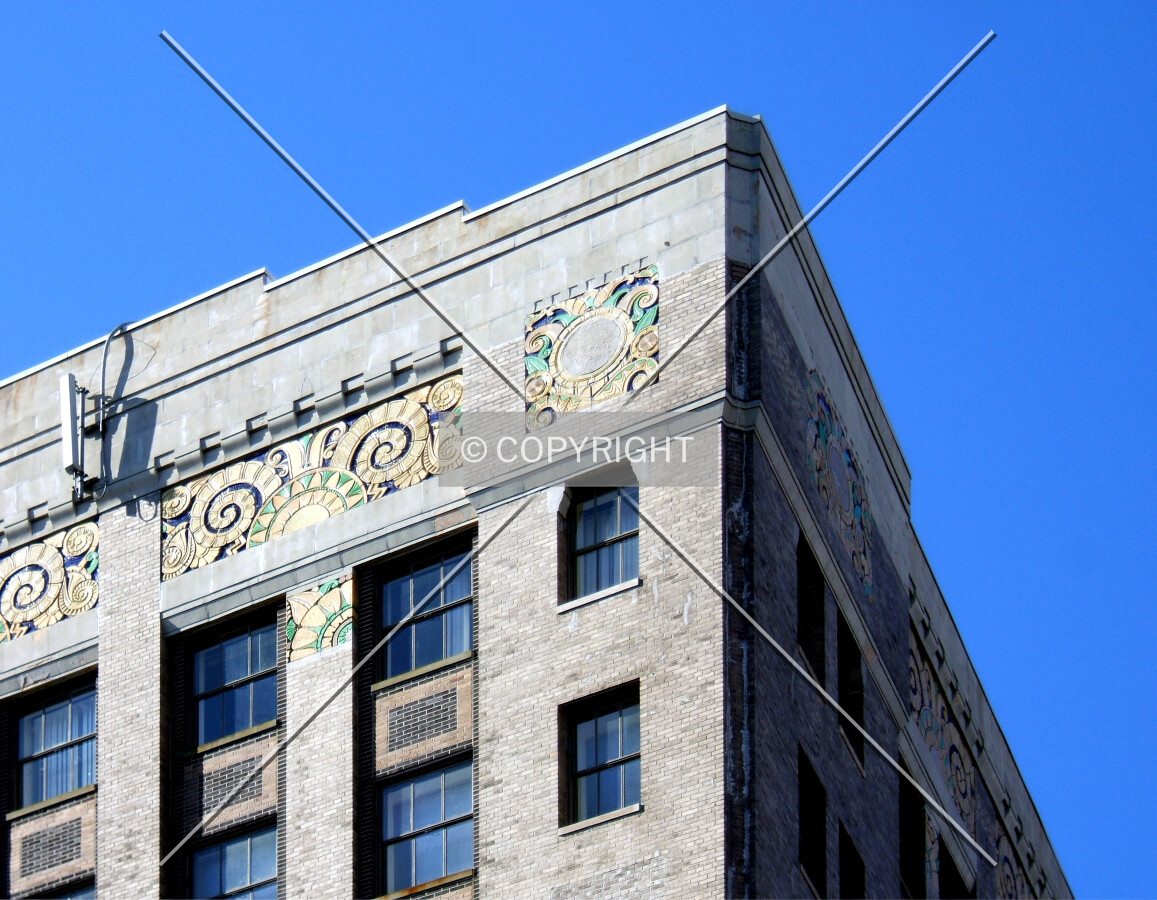Cornice detail viewed from the northeast at Main and John Streets