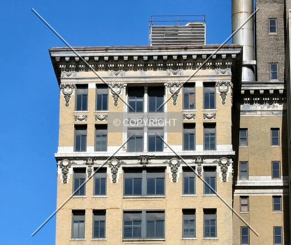 Upper floors on narrow south face, from Kellogg Boulevard