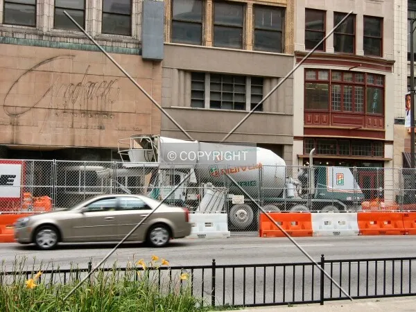 Concrete truck leaving along Washington Street