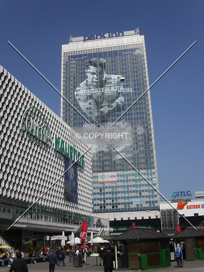 Building from Alexander Platz with new bilboard on front facade