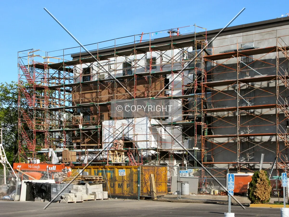 Masonry installation on the east facade