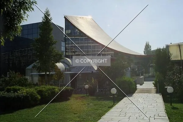 Displaying the curved roof that it shares with Atrina Center 4