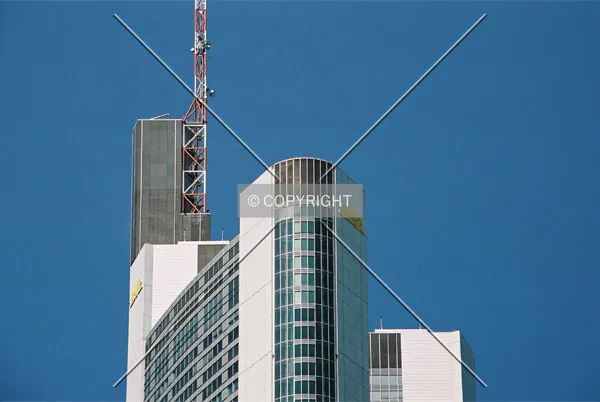 Top of the tower including logo and antenna