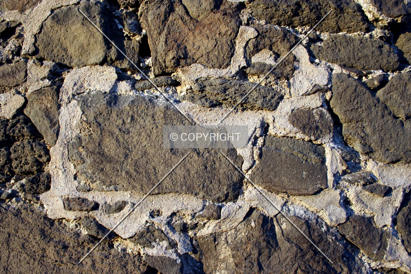 Facade detail with blocks of basalt