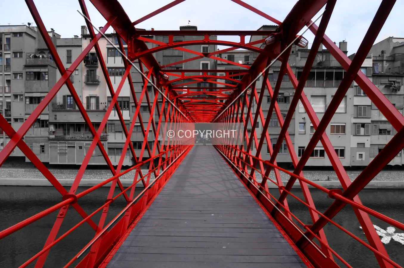 Red bridge over Fluvia River in Girona
