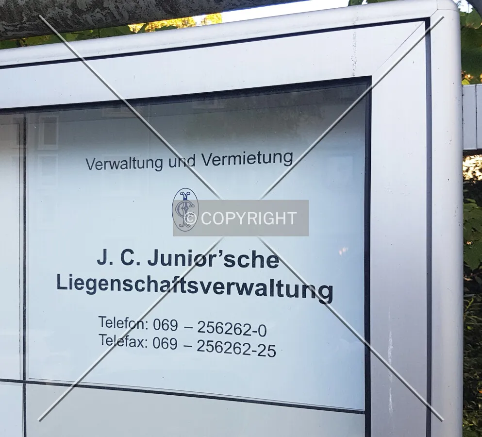 J.C. Junior´sche Liegenschaftsverwaltung - Sign showing the property manager of the building
