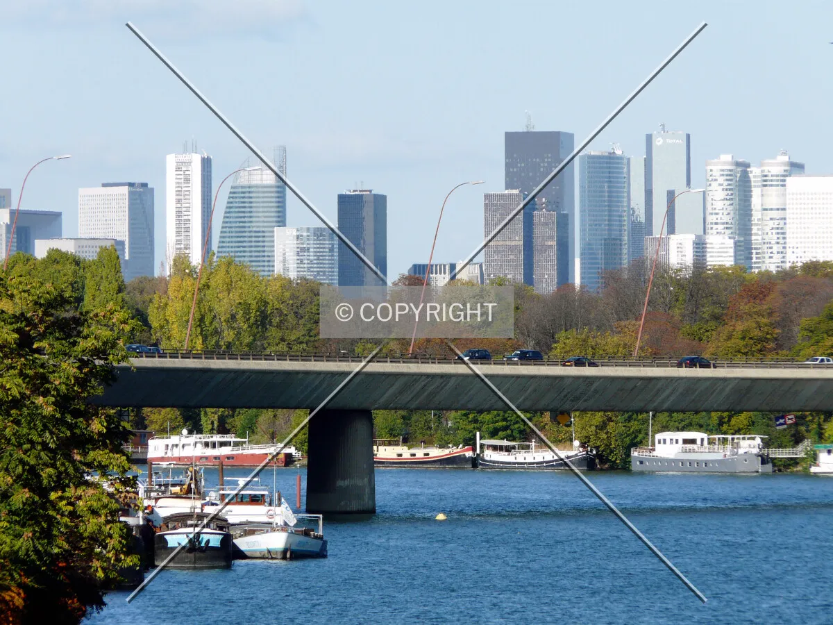 Distant view from Pont de Saint-Cloud, the bridge over the River Seine