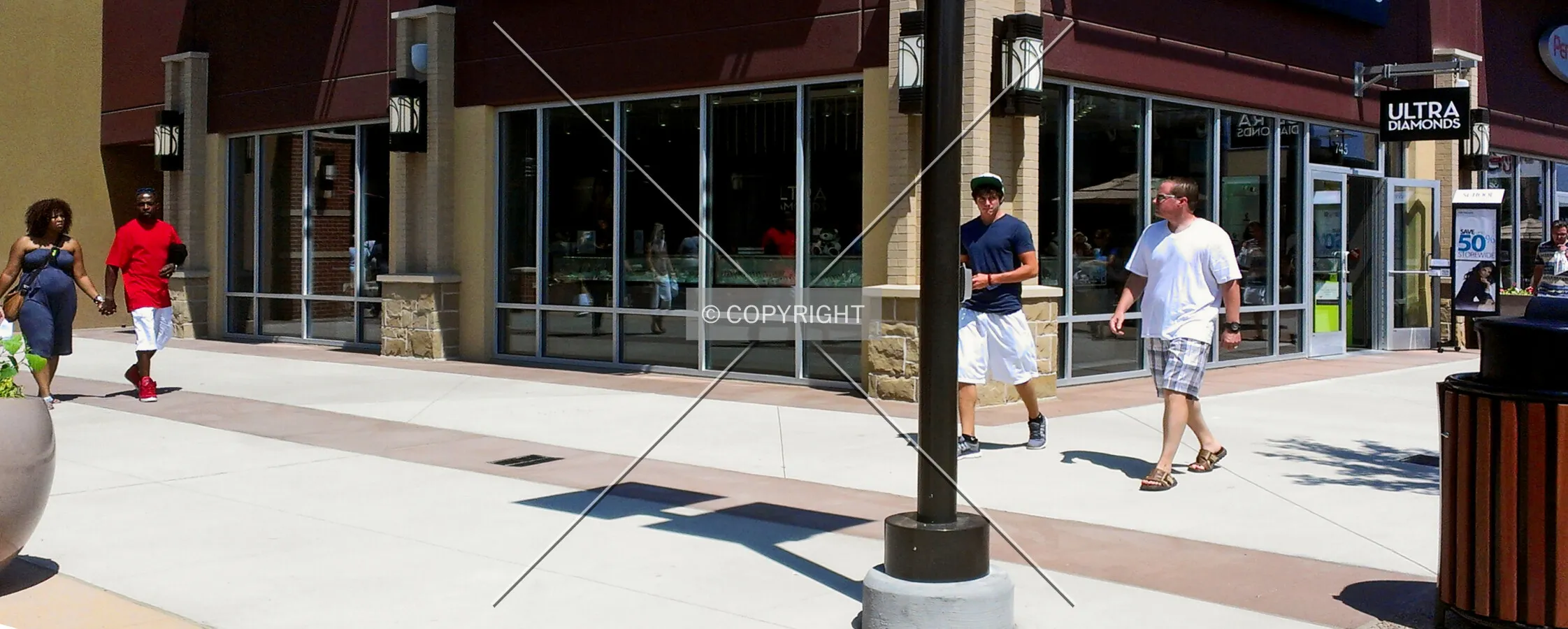 Shoppers strolling through St. Louis Premium Outlets