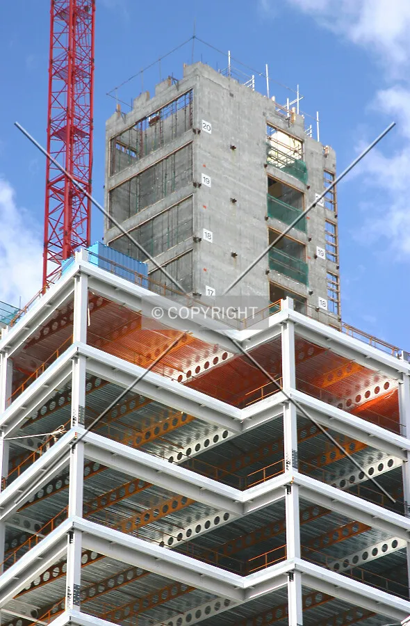 View northwest looking up at the core shrouded in steelwork
